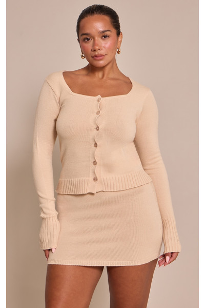 Форма вівсяної каші в трикотажному кардигану