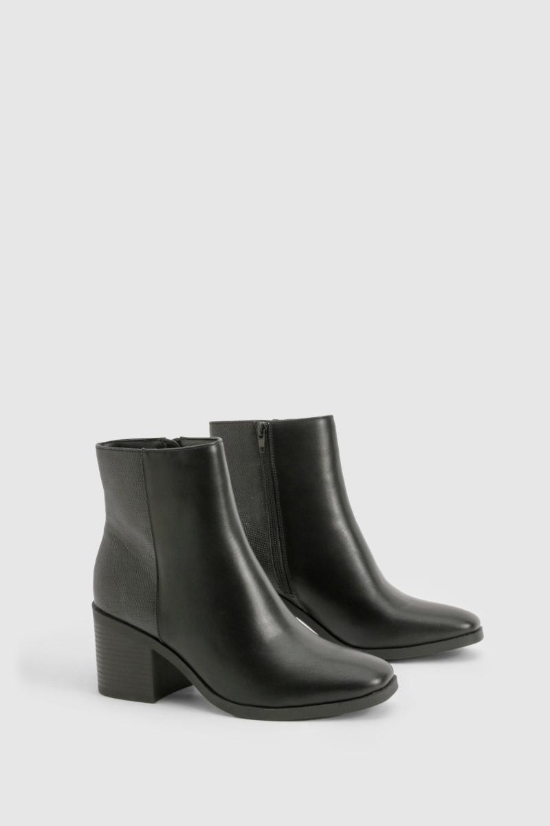 Чоботи взуття з зміїною панеллю