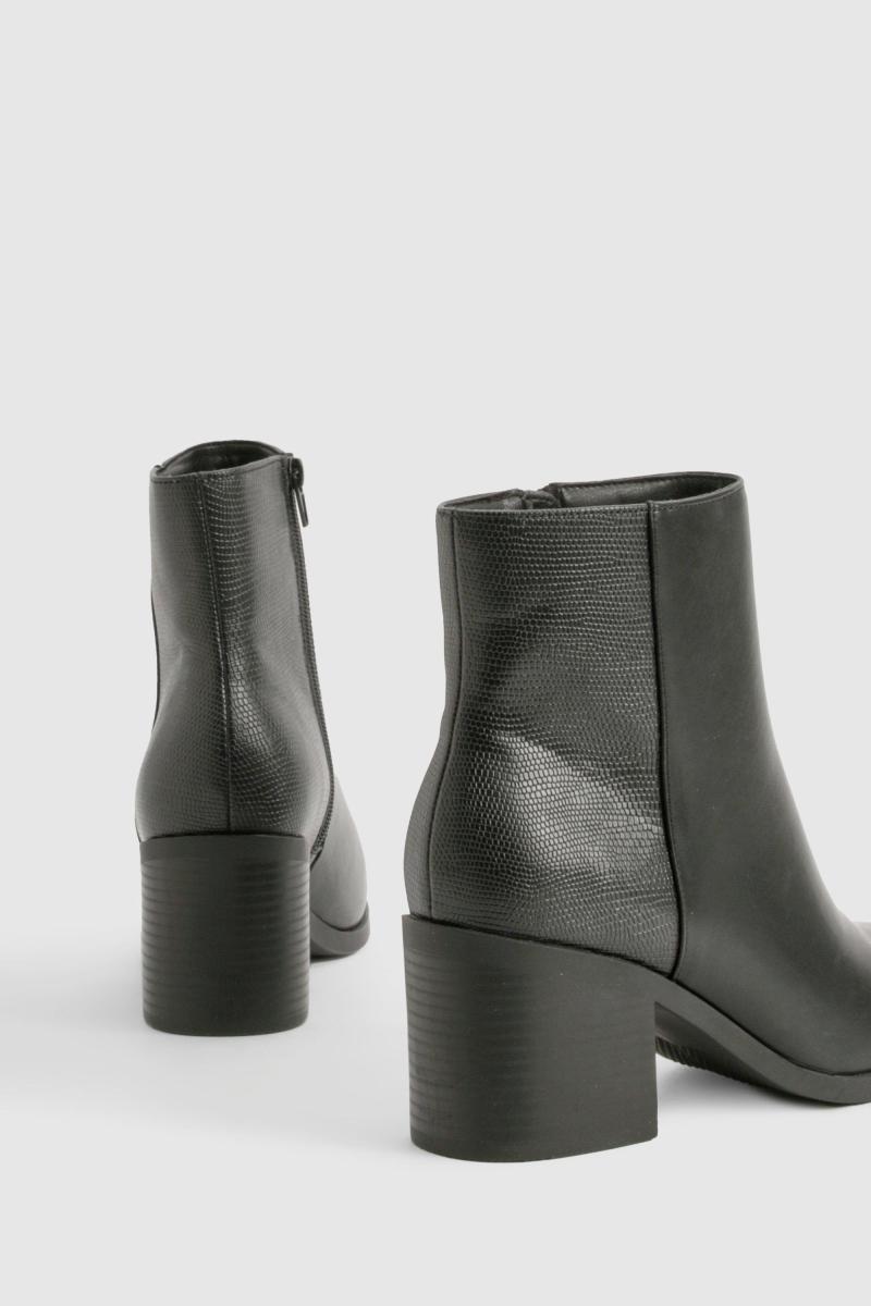 Чоботи взуття з зміїною панеллю