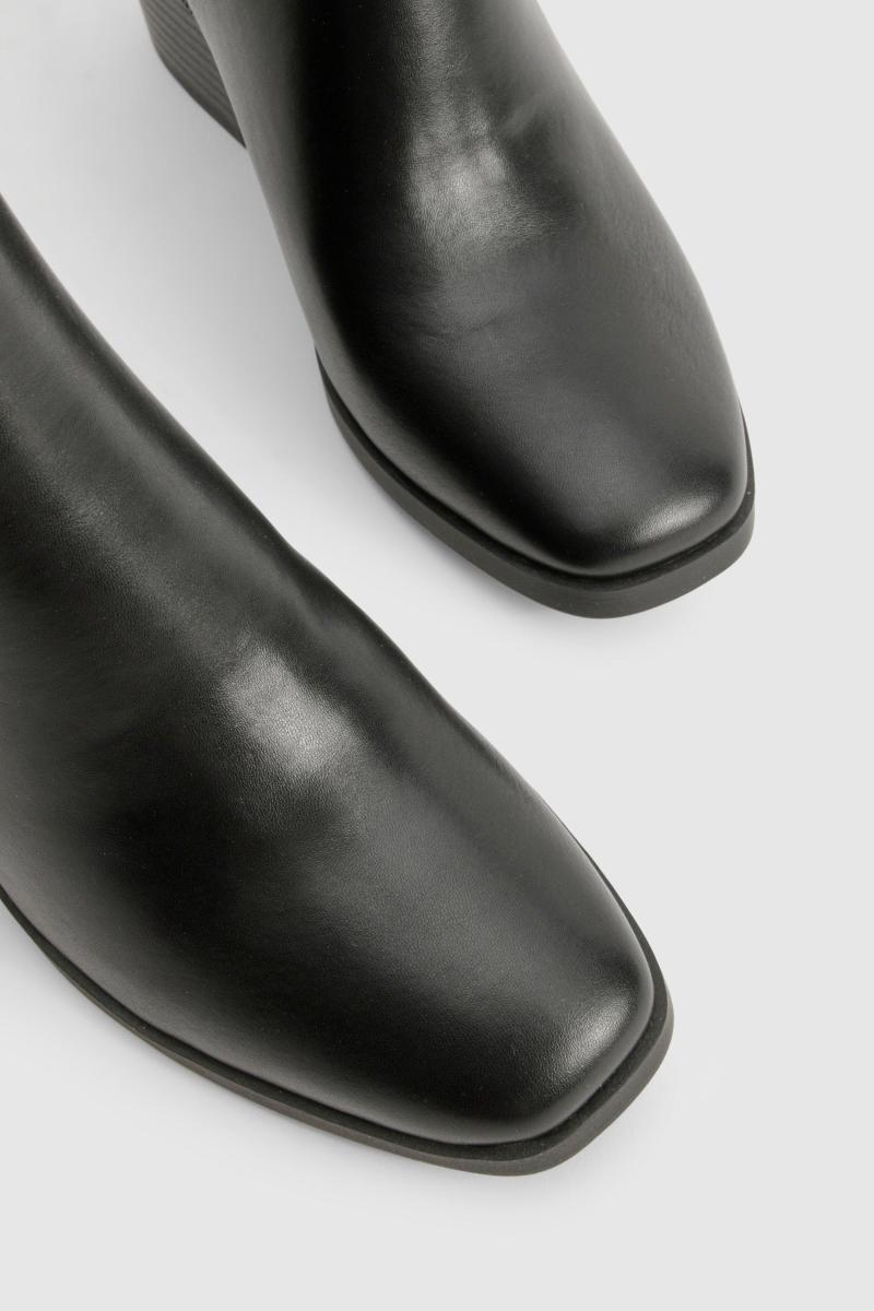 Чоботи взуття з зміїною панеллю