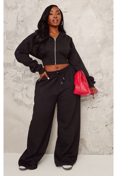 Плюс широкі штани для бігу з чорними швами Плюс широкі штани для бігу з чорними швами