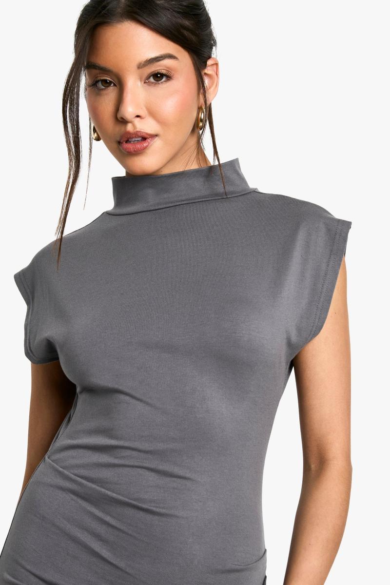 Рухедна сукня з високою шиєю Мідаксі