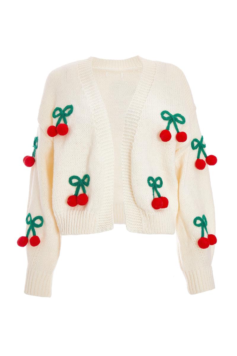 Від білого в’язаного вишневого кардигану