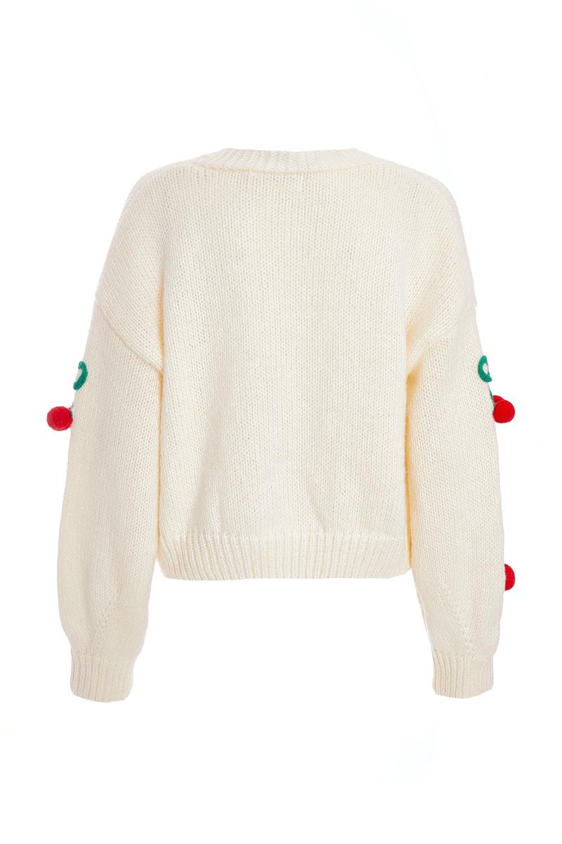 Від білого в’язаного вишневого кардигану